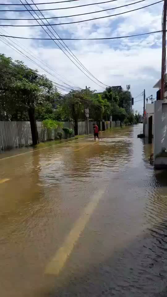 Video showing a flooded local road